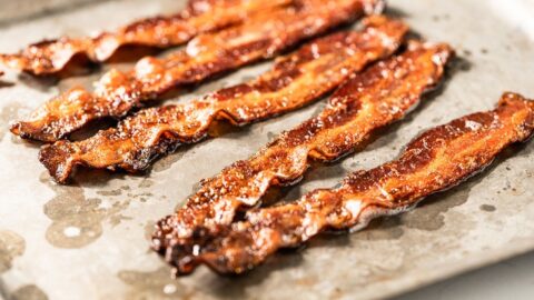https://saltpepperskillet.com/wp-content/uploads/How-to-Cook-Bacon-in-the-Oven-horizontal-480x270.jpg
