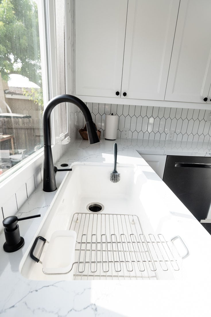 Moen Sleek Matte Black and Kohler Riverby sink