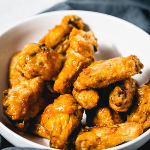 air fryer bbq chicken wings close up in bowl