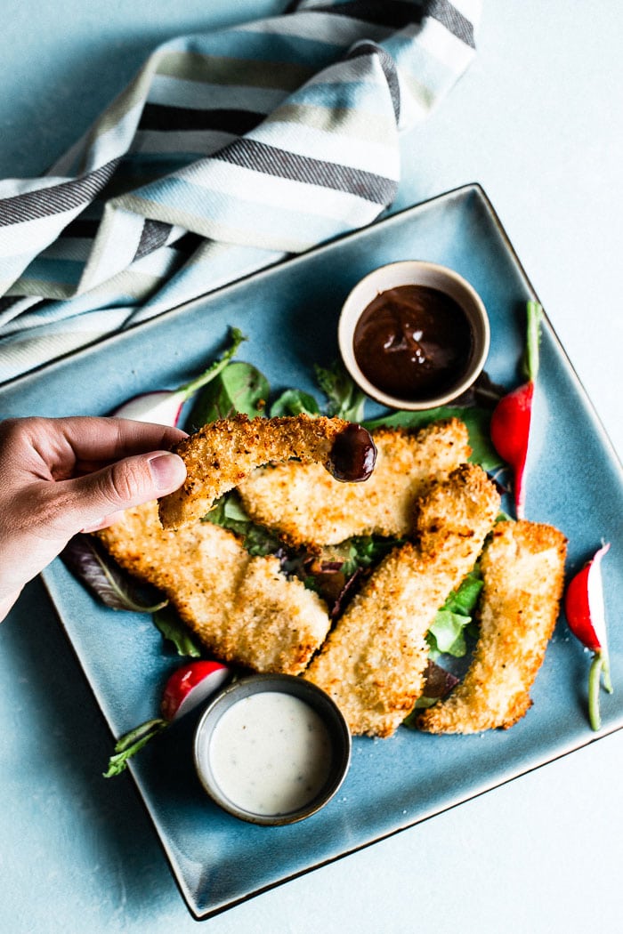 air fryer chicken tenders dipping in bbq sauce