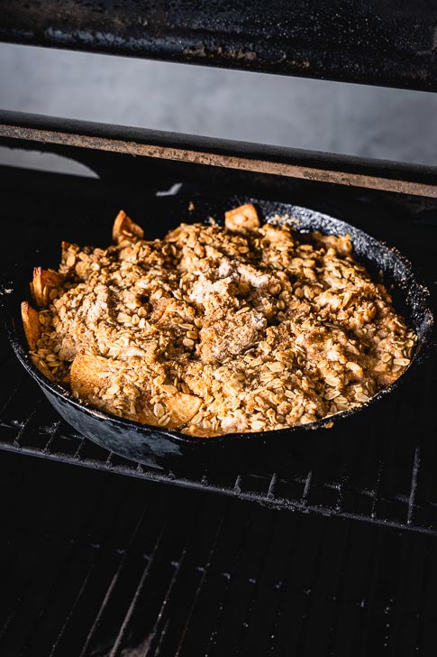 apple crisp baking in smoker vertical