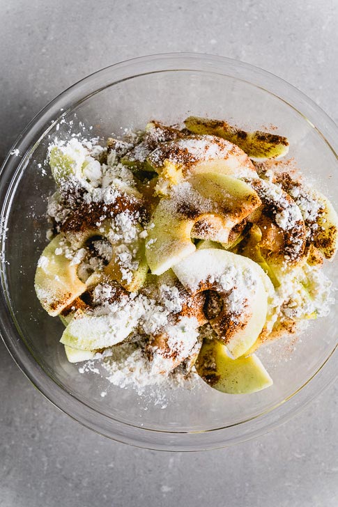 apple crisp filling in a bowl before mixing