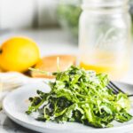 arugula salad with lemon vinaigrette on plate