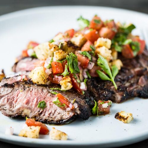 aussie flank steak with breadcrumb salsa closeup horizontal