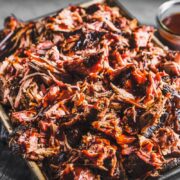 bbq pulled pork on a sheet pan with bbq sauce horizontal 1