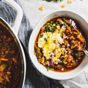 beef chili in a bowl with toppings horizontal 1