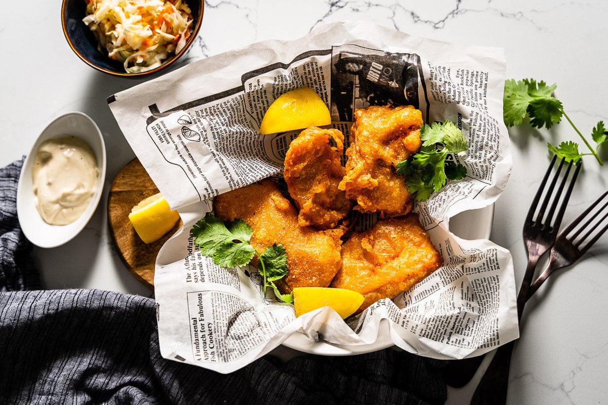 beer battered deep fried salmon on parchment horizontal