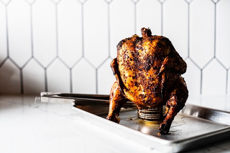 beer can chicken resting on sheet pan horizontal