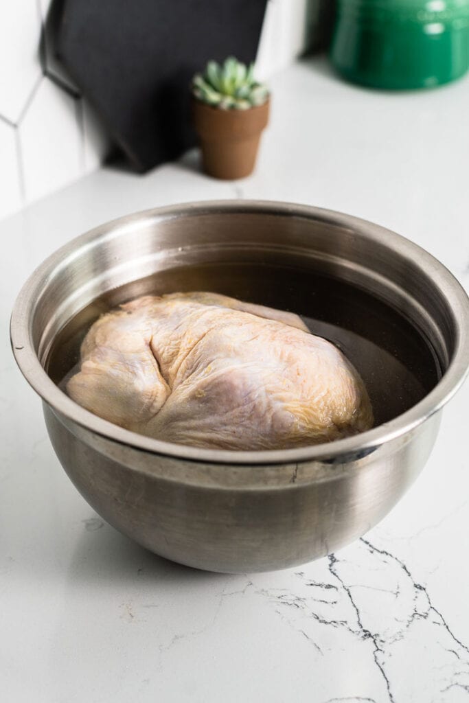 brining chicken in bowl