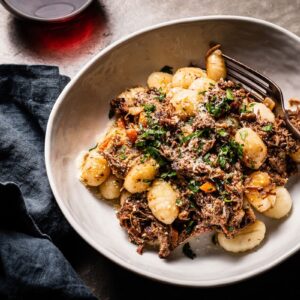 brisket ragu with gnocchi in bowl overhead