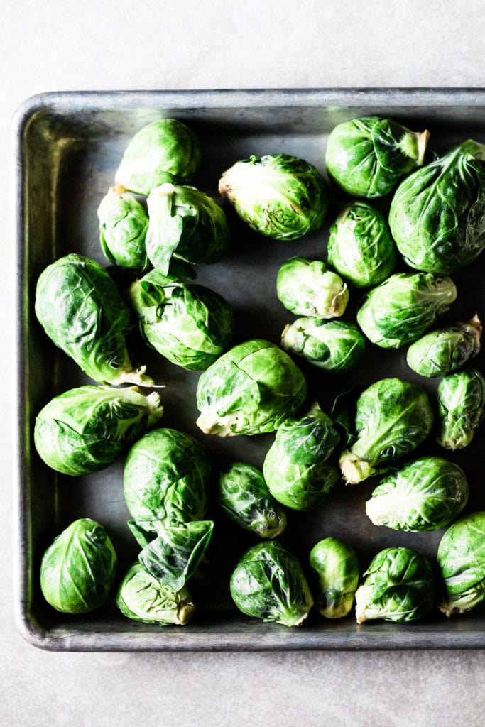 whole brussels sprouts on a sheet pan
