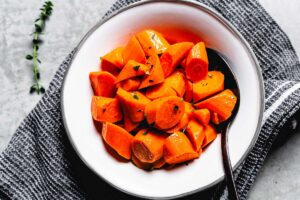 buttery boiled carrots in bowl horizontal 1