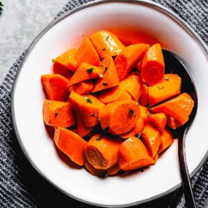 buttery boiled carrots in bowl horizontal 1