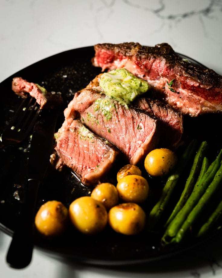 close up of sous vide tomahawk steak on plate 2