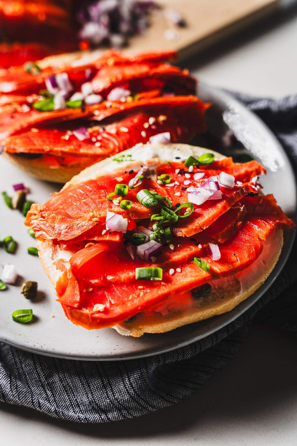 cold smoked salmon on bagel close up 1