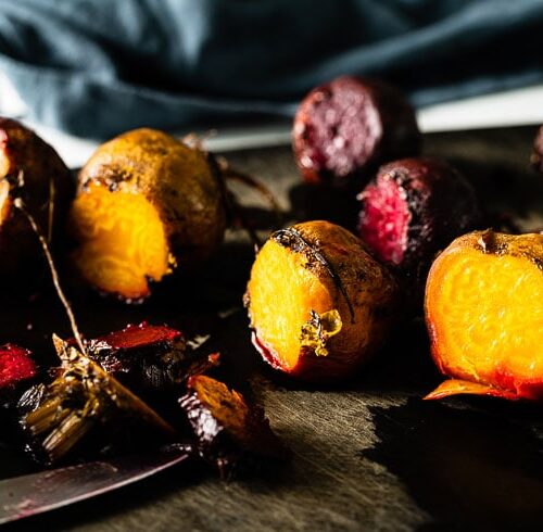 colorful cooked beets on cutting board horizontal