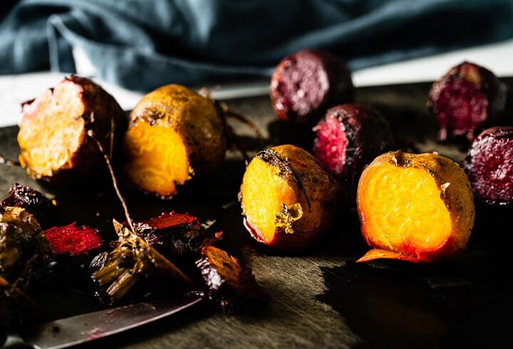 colorful cooked beets on cutting board horizontal