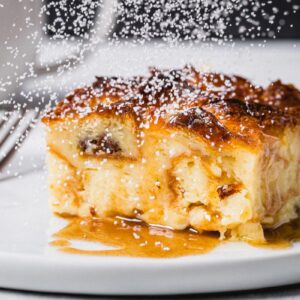 croissant bread pudding on a plate close up