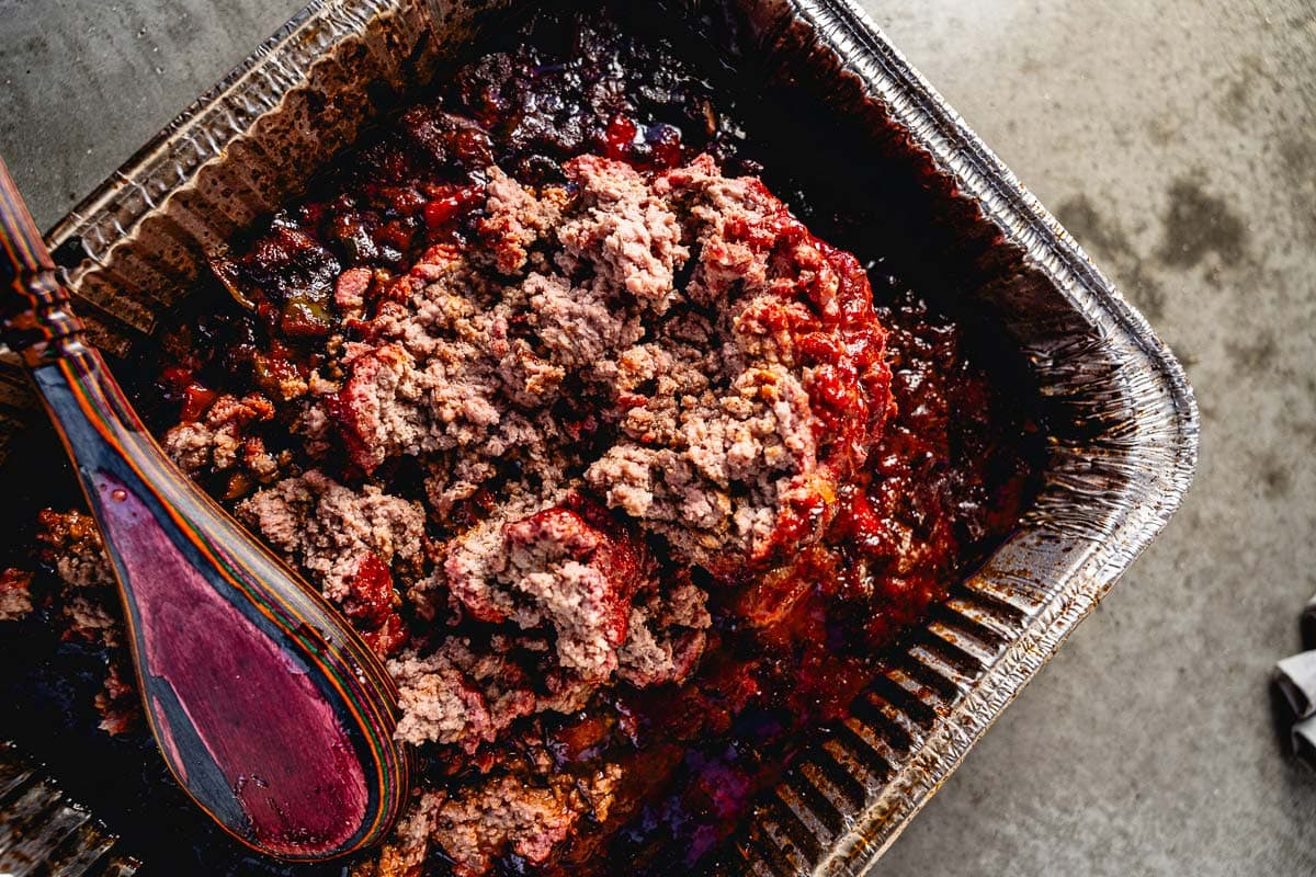 crumbling meat into over the top chili