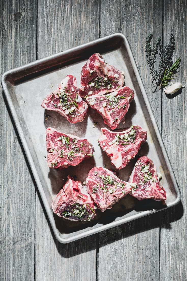 garlic and herb marinated lamb chops on sheet pan