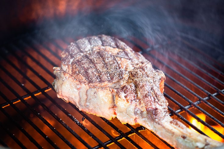 grill searing tomahawk steak horizontal