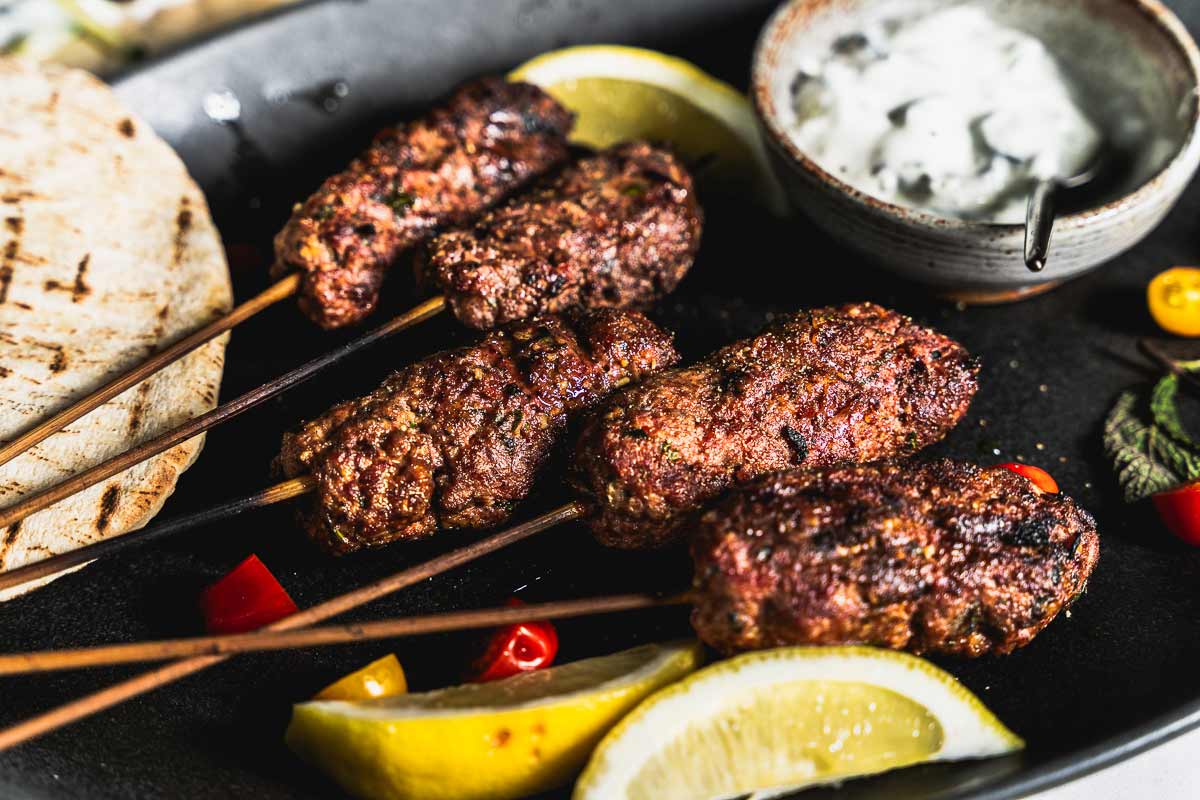 ground lamb kofta close up on plate