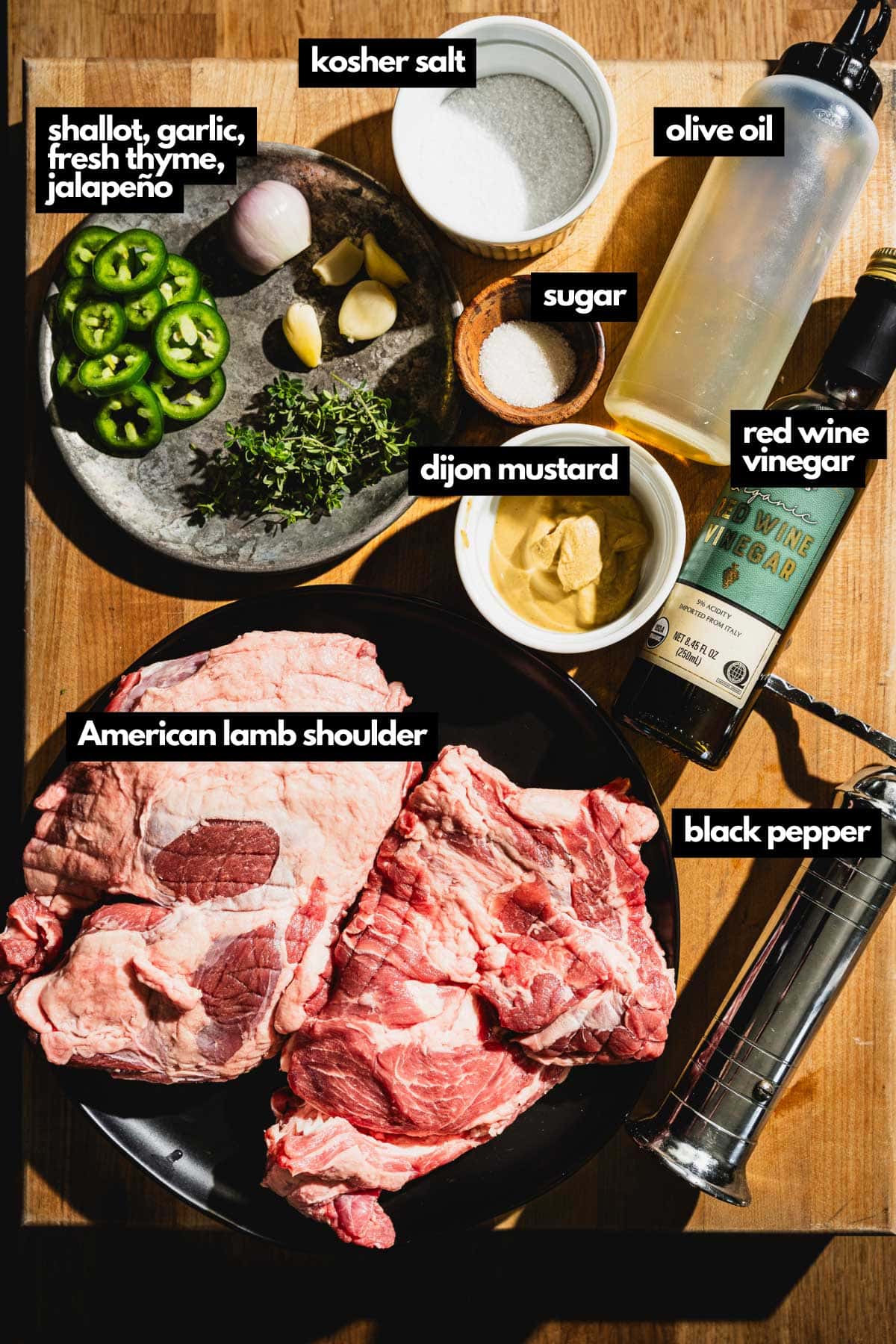 ingredients on board for grilled lamb shoudler
