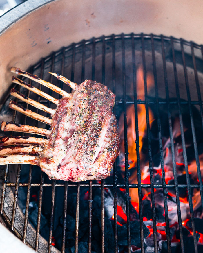 grilled rack of lamb on green egg turned