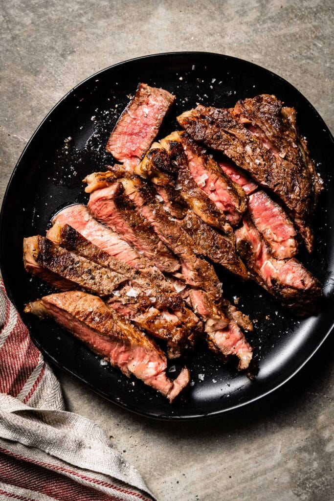 grilled rib eye steak sliced overhead