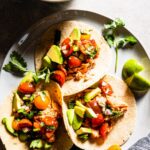 grilled salmon tacos with fresh tomato salsa overhead