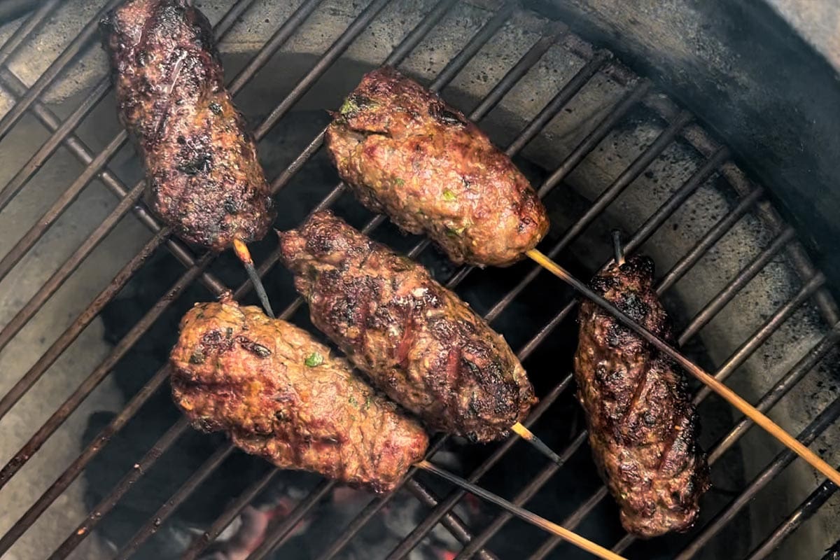 grilling adana kebabs on a big green egg