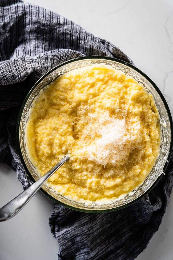 mixing parmesan into sous vide polenta