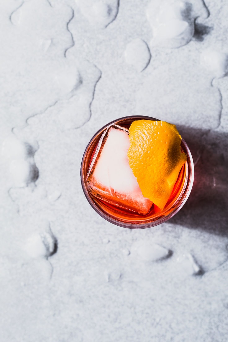 negroni cocktail recipe overhead sourrounded by ice