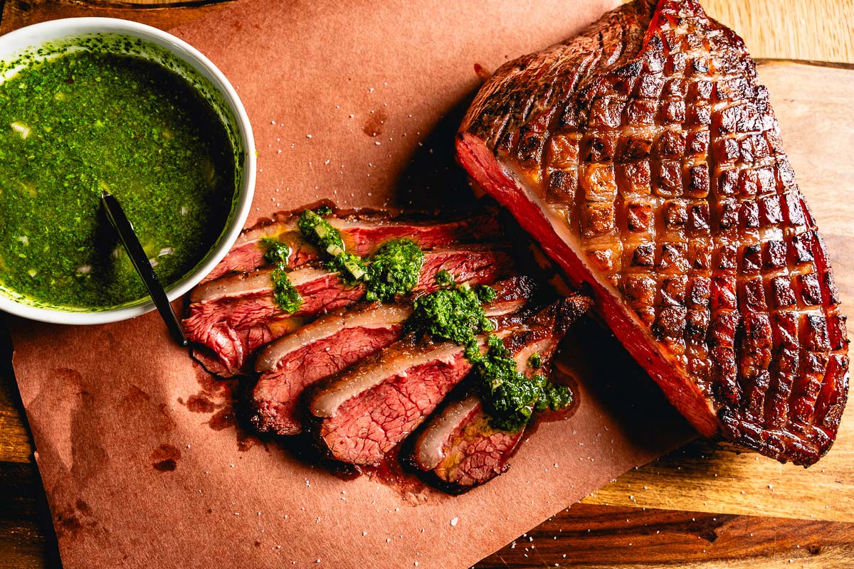 https://saltpepperskillet.com/wp-content/uploads/picanha-steak-with-chimichurri-overhead-horizontal.jpg