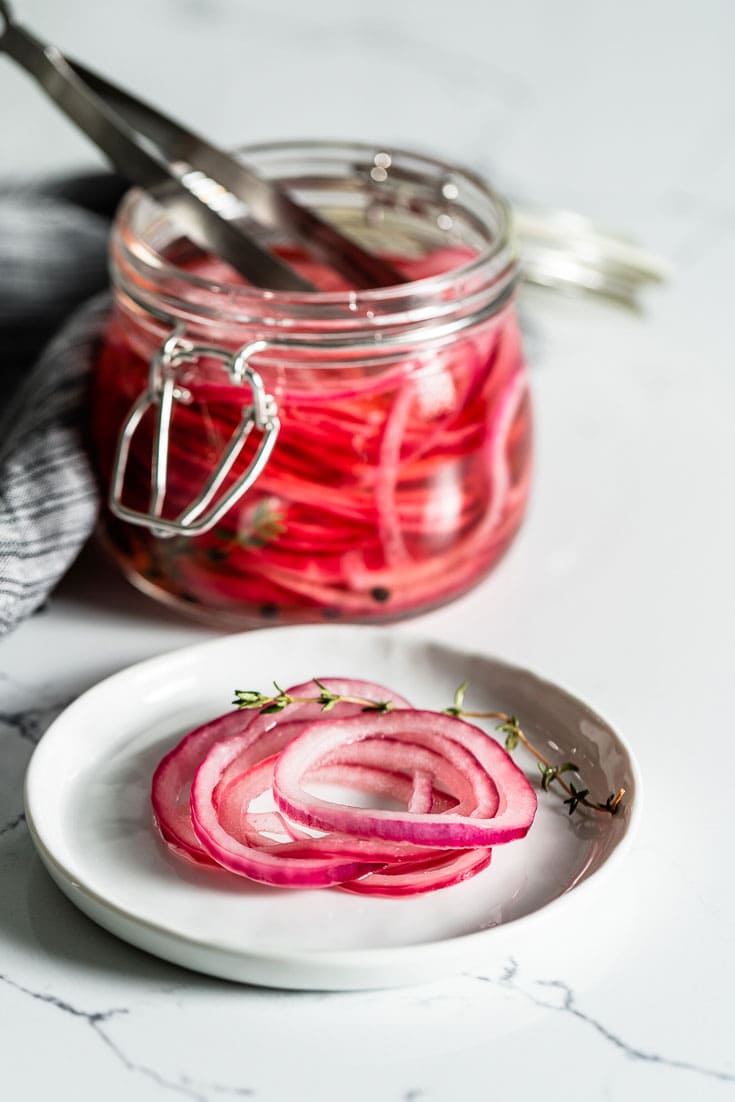 pickled red onions on plate