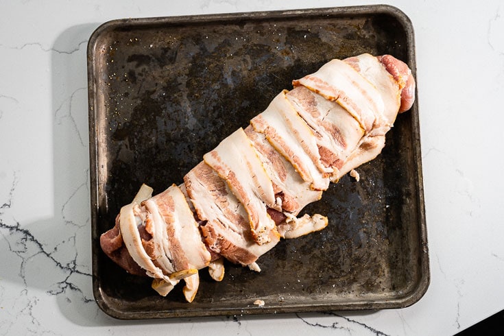 prepping bacon wrapped pork tenderloin for smoker