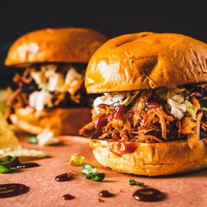 pulled pork sandwiches on butcher paper horizontal