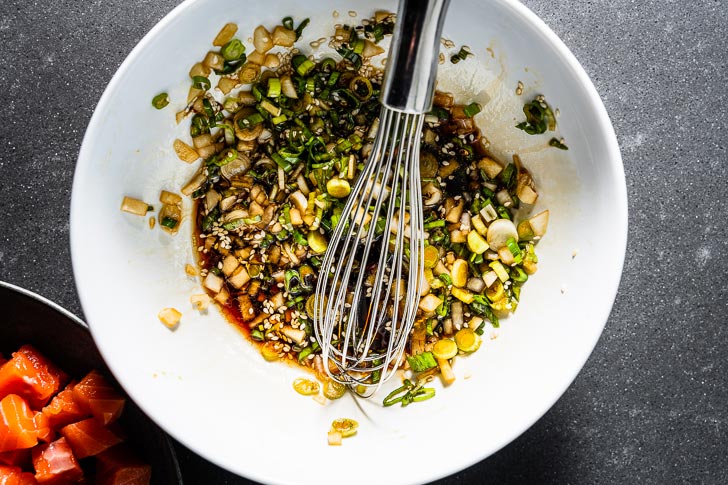 salmon poke sauce mixing with whisk