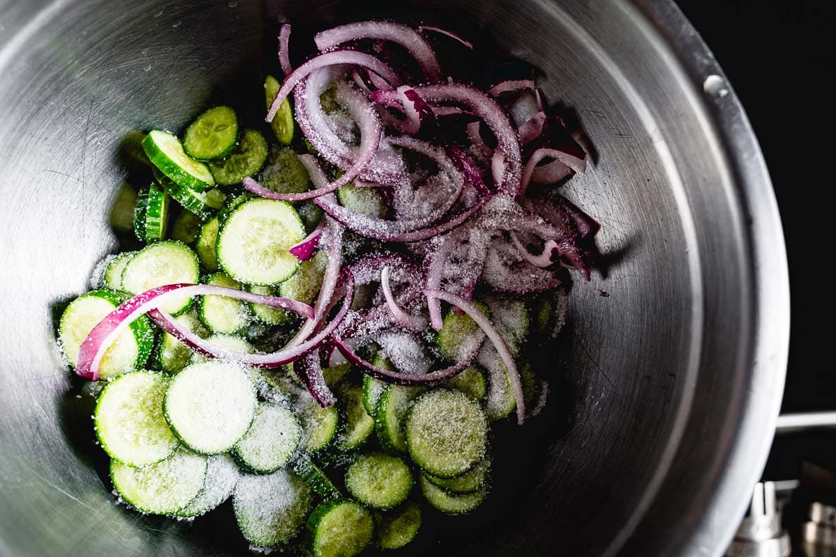 salting the cucumbers and onions