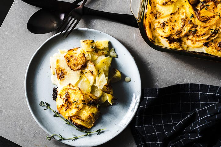 scalloped potatoes on plate overhead