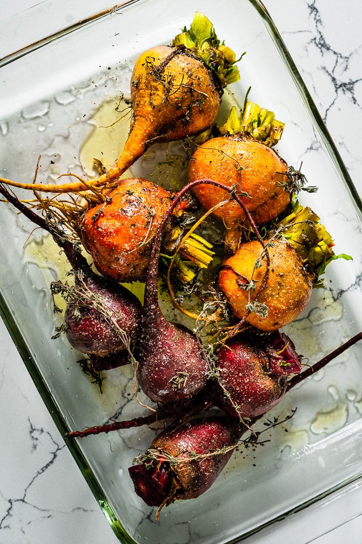 seasoned raw beets in roasting pan