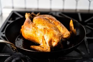 simple roast chicken in skillet on stove horizontal 3