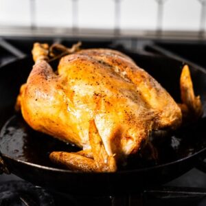 simple roast chicken in skillet on stove horizontal 3