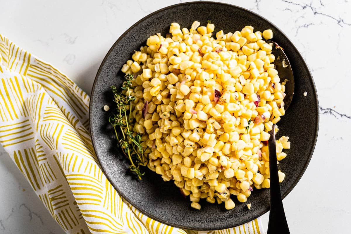 simple sautéed corn on plate horizontal