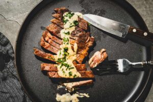 skillet pork steaks with creamy pan sauce overhead