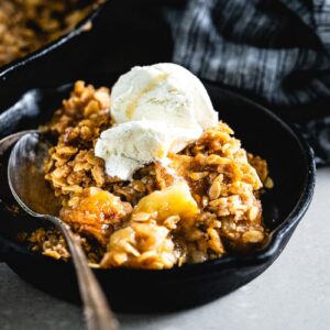 smoked apple crisp in skillet featured