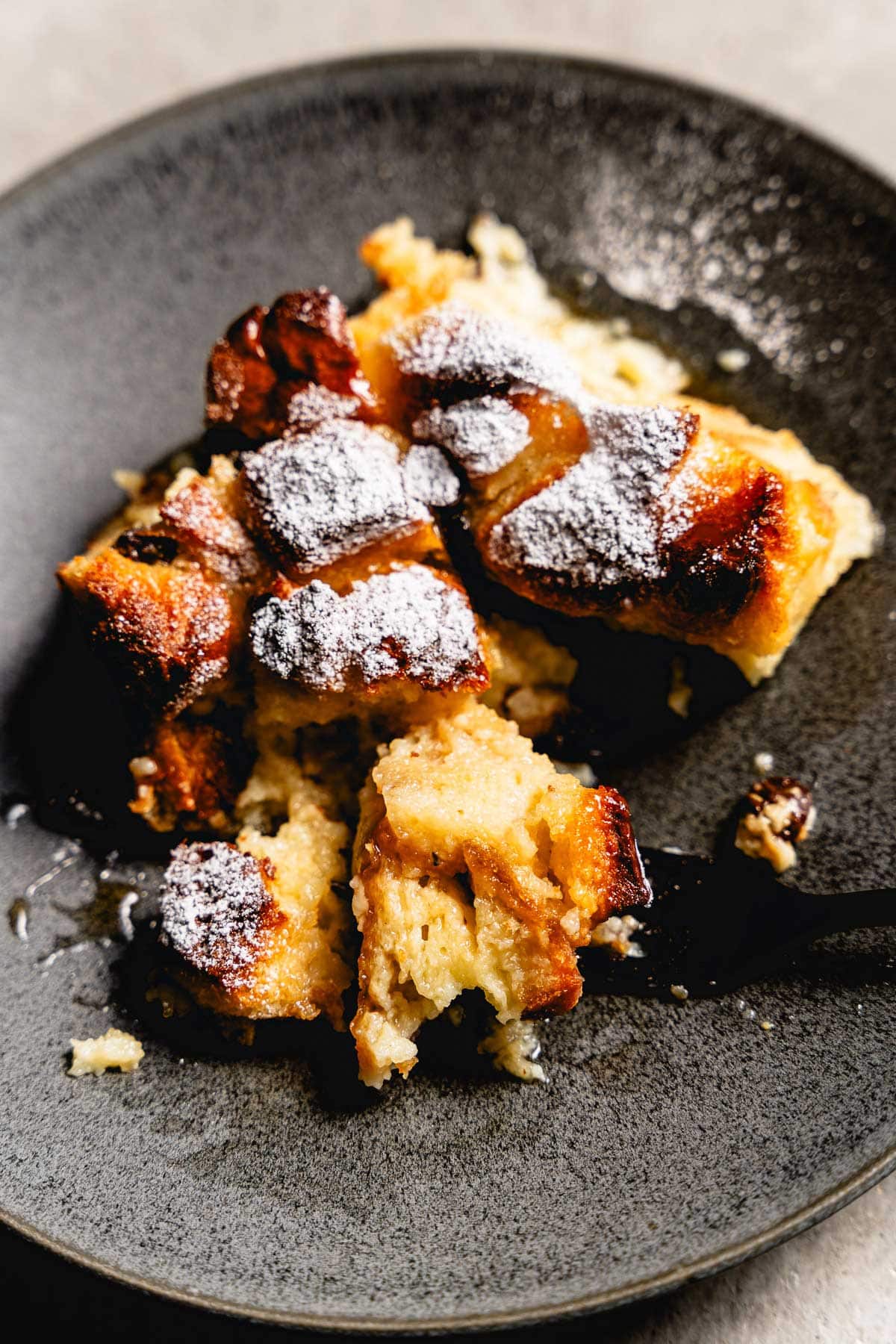 smoked bread pudding recipe on plate vertical
