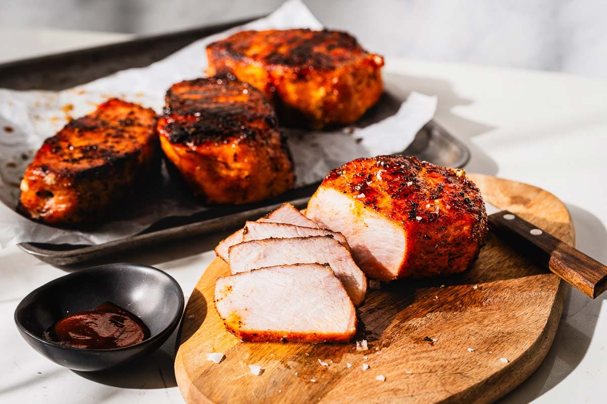 smoked pork chop on a cutting board horizontal