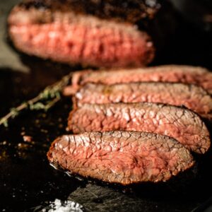 smoked tri tip on cutting board 1