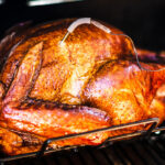 smoked turkey in smoker horizontal